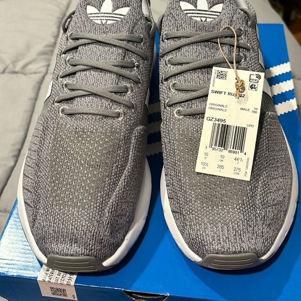 Men’s Adidas Swift run 22 new with tags in box. Size 10 1/2